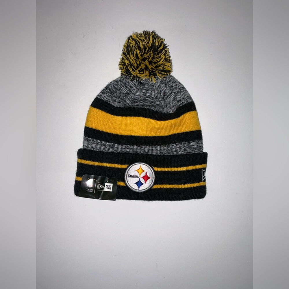 Pittsburgh Steelers New Era Striped Cuffed Pom Beanie